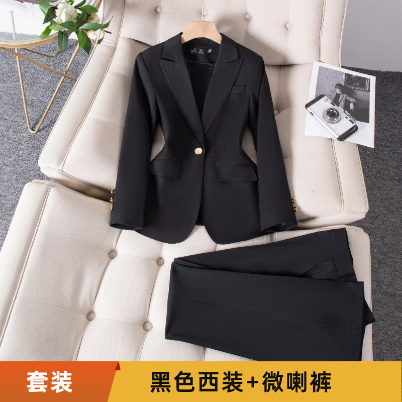 Black suit with slightly flared trousers
