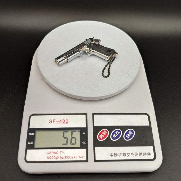 ของขวัญพวงกุญแจโมเดลปืนทำจากโลหะทั้งหมด1911สีเงินสว่าง1:3อยู่รอด - Product Image 2