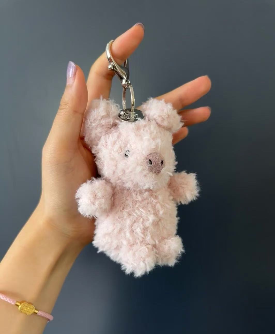 Pendentif cochon frisé