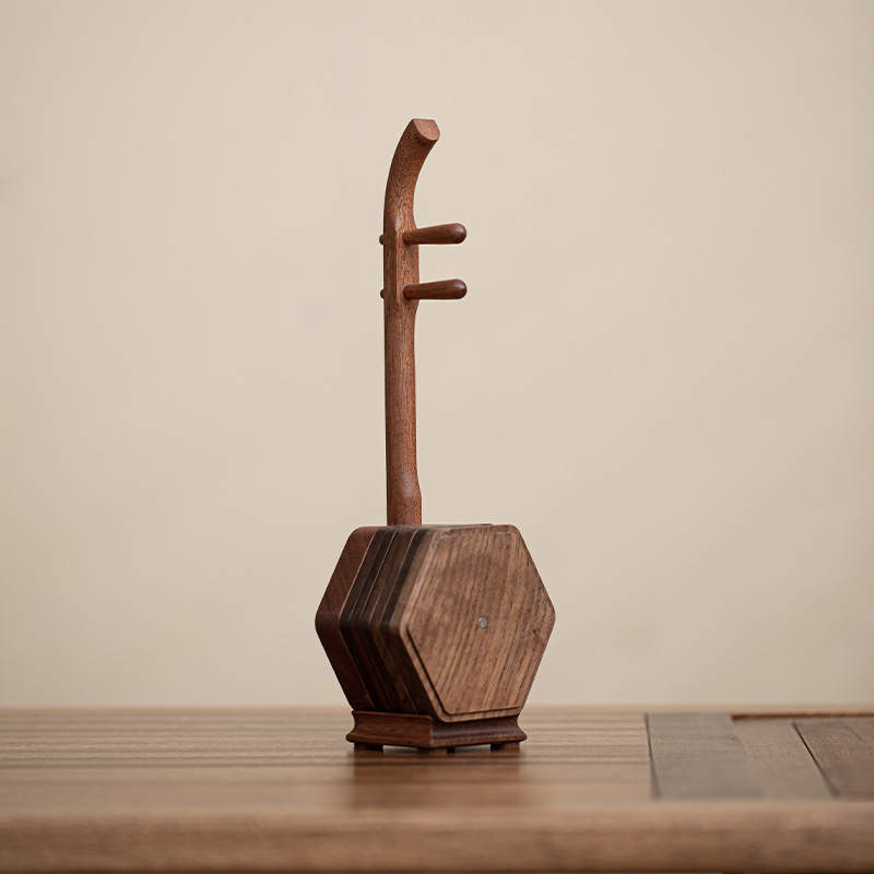 Dessous de verre en bois de noyer avec une touche de temps (forme Erhu)