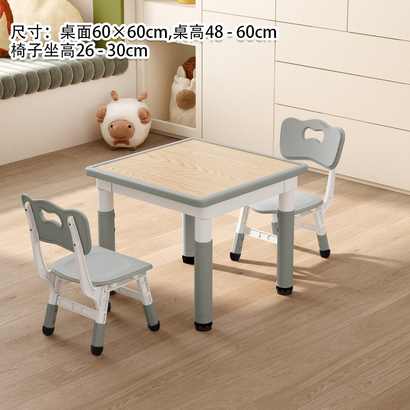 A table and two chairs in wood grain gray.