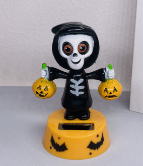 Black Handheld Pumpkin