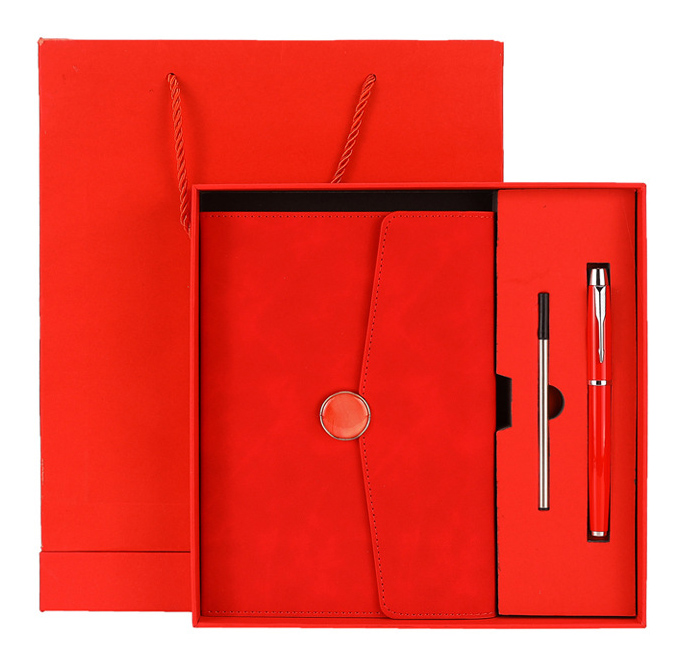 Cuaderno rojo + bolígrafo