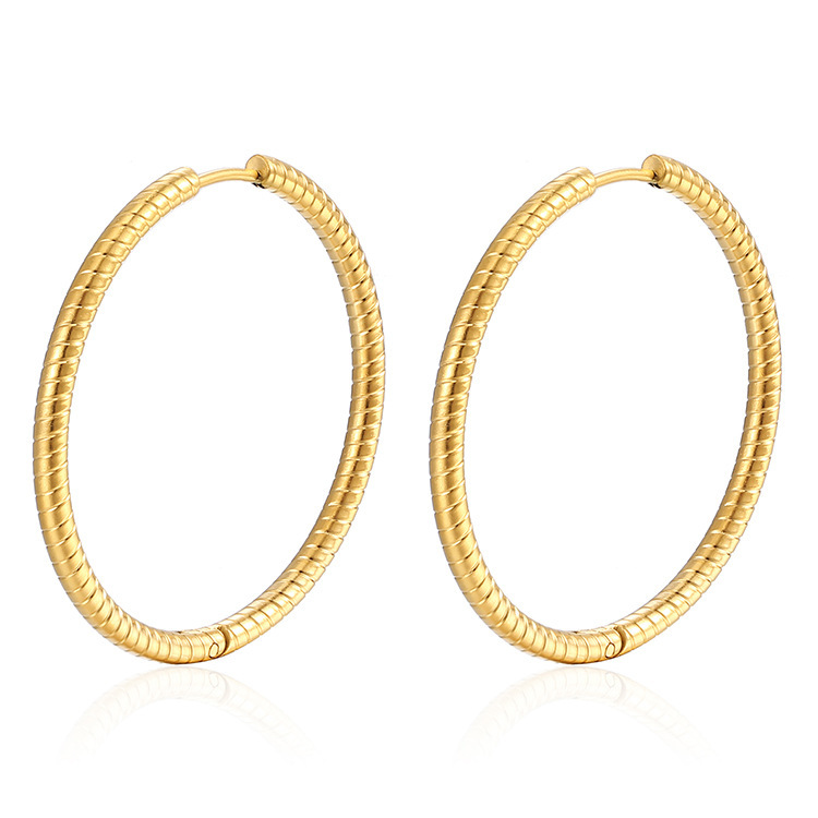 Boucles d'oreilles motif rotatif or