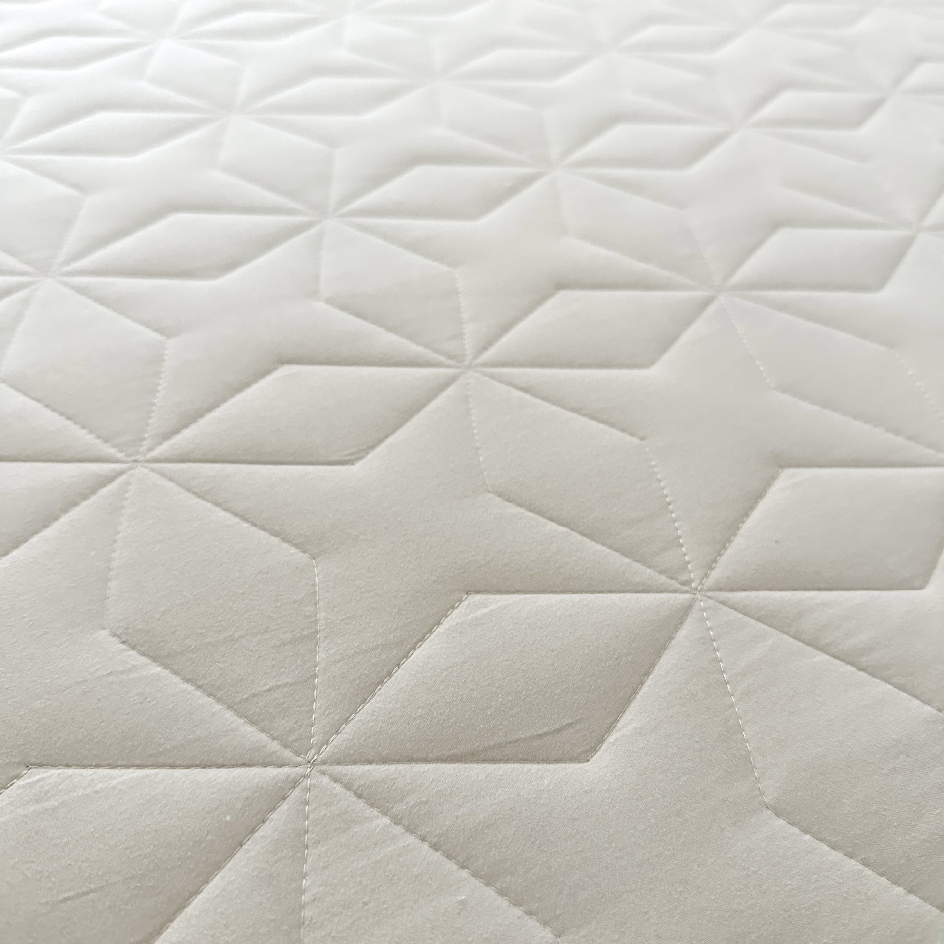 Motif matelassé losange