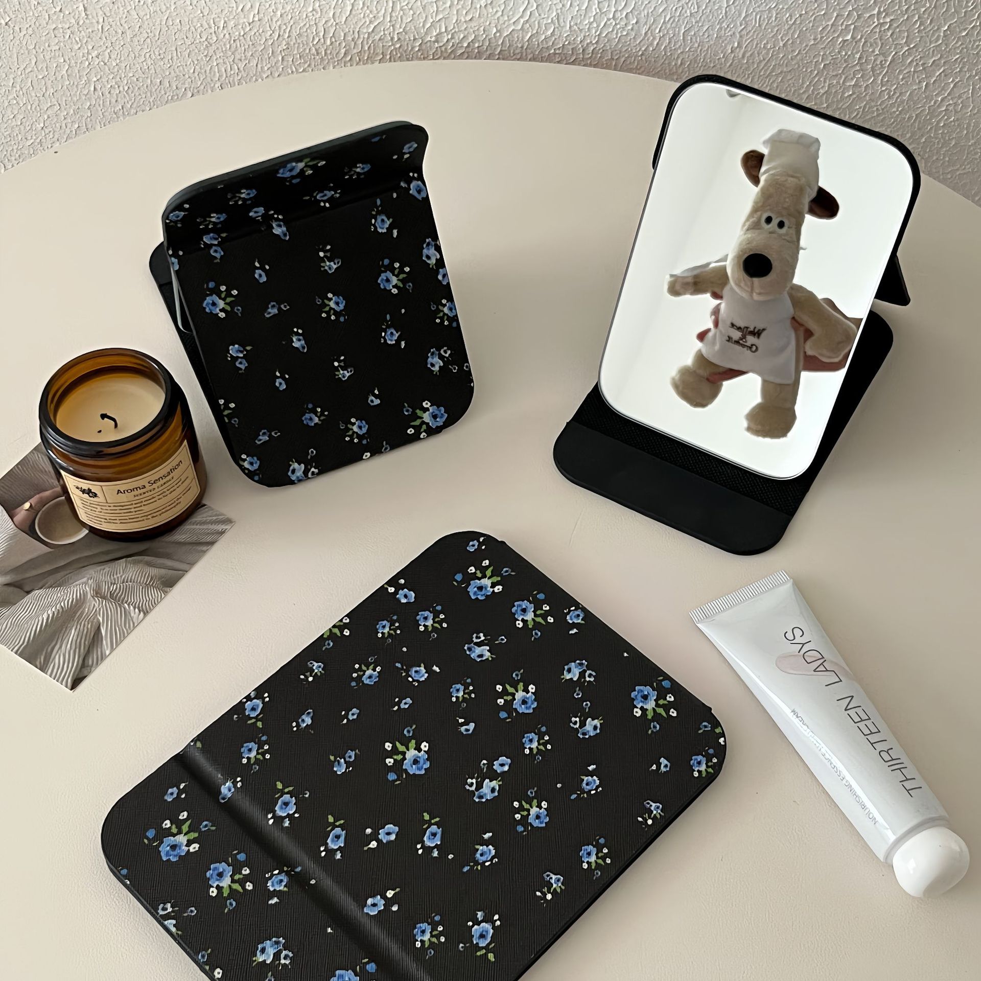 Black background with blue floral pattern