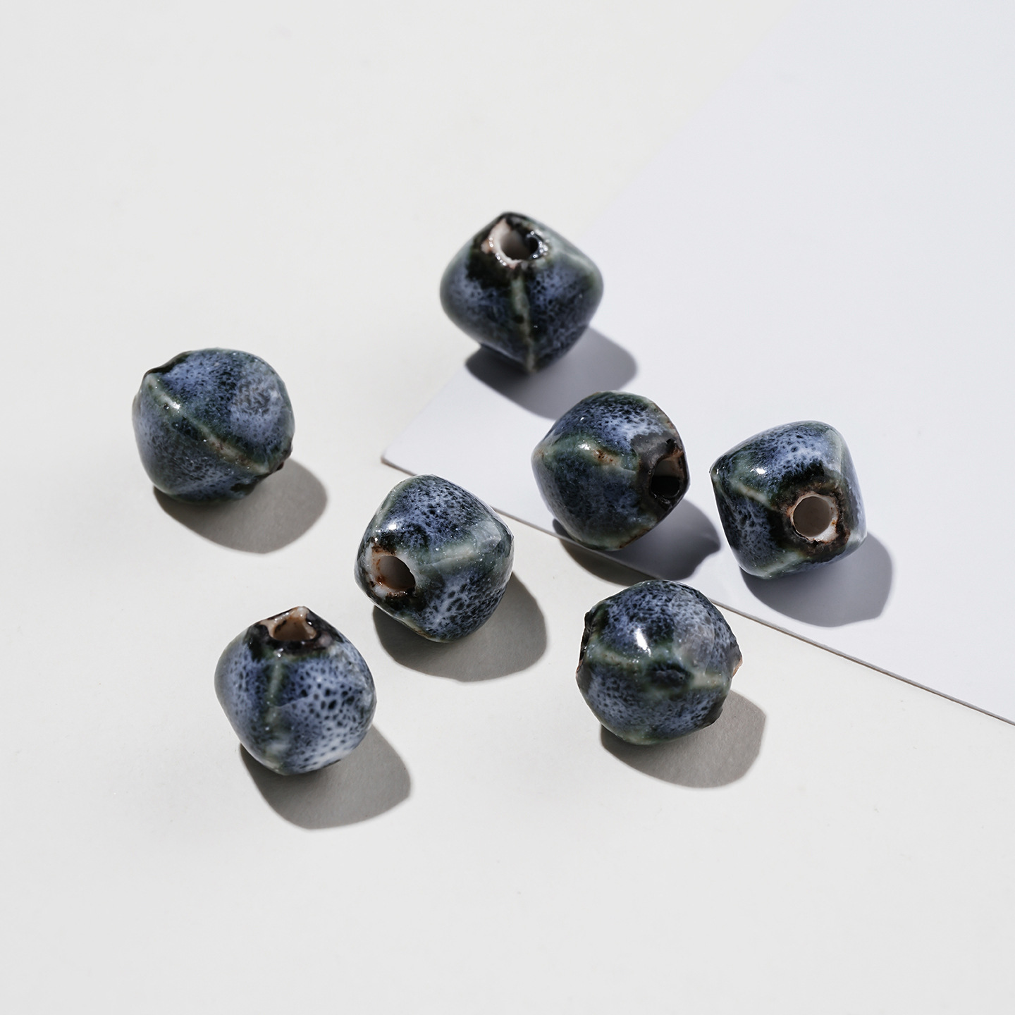 The glaze has irregular gray patterns.
