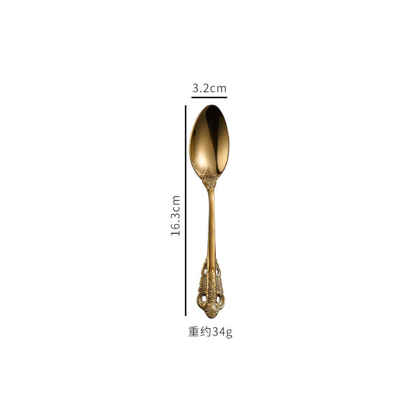 Golden dessert spoon