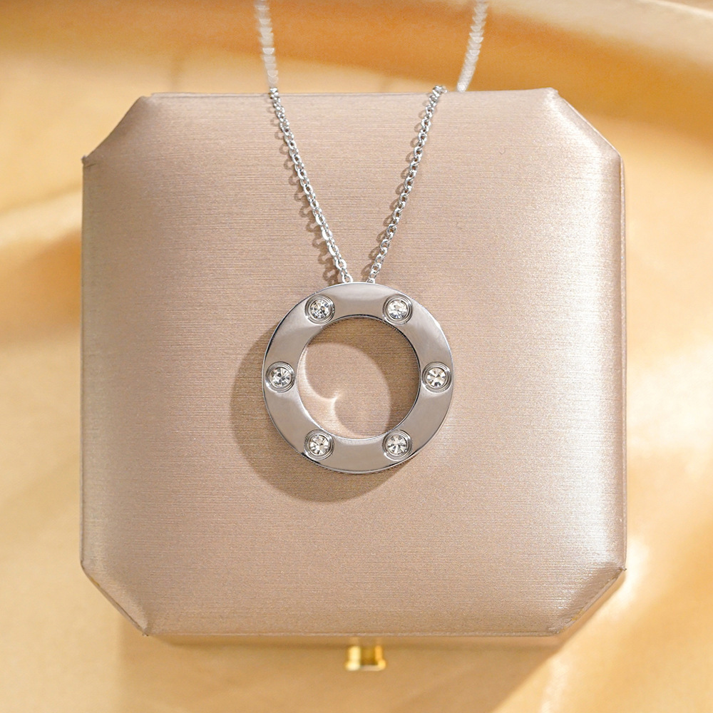 Silver round necklace, 6 diamonds, slightly large