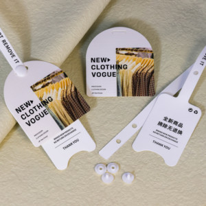 Perfume con logotipo personalizado de fábrica más popular, papel ecológico, etiqueta colgante de joyería pequeña redonda negra con cuerda elástica