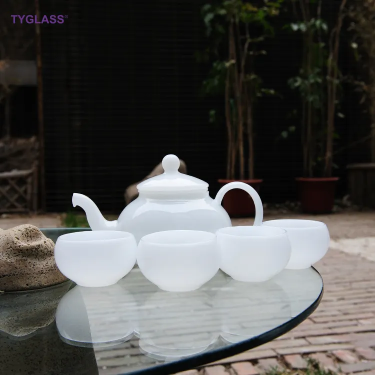Cangkir teh kaca borosilikat Tiongkok jumlah besar antik kustom dan pot cangkir teh dan set piring cangkir teh warna putih buram