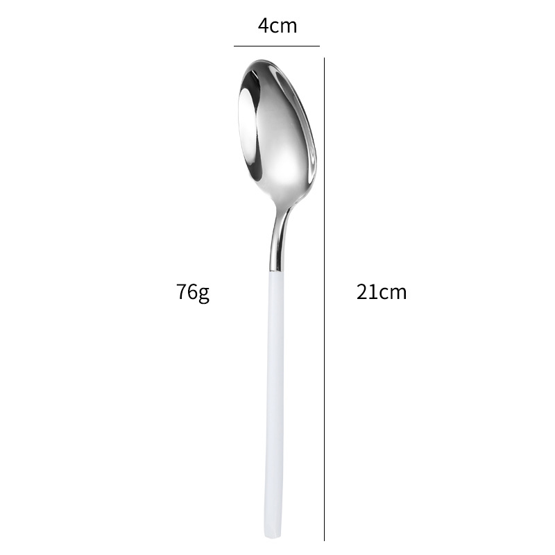 Cuillère de table argentée et blanche