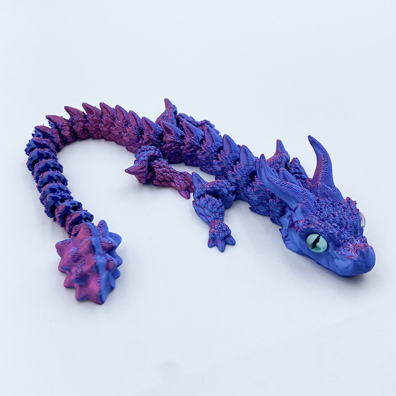 Ceratopsiano rojo y azul de 23,5 cm.