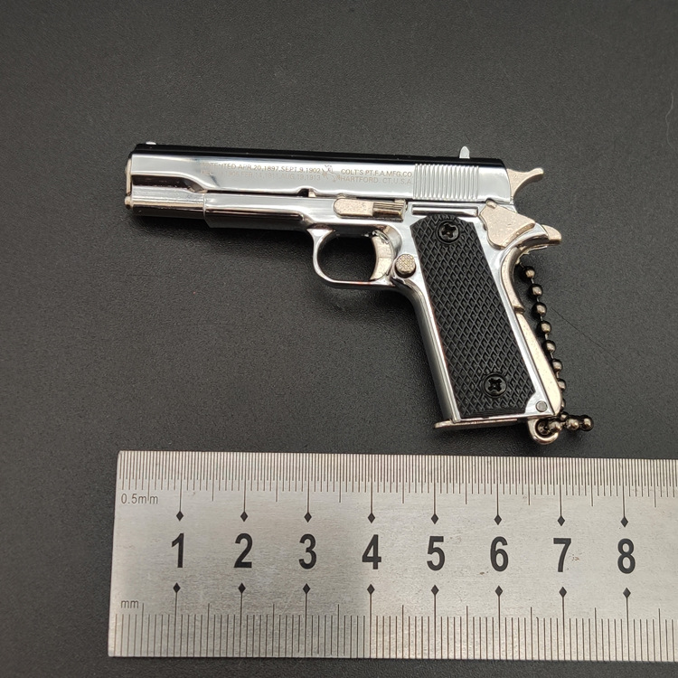 ของขวัญพวงกุญแจโมเดลปืนทำจากโลหะทั้งหมด1911สีเงินสว่าง1:3อยู่รอด - Product Image 1