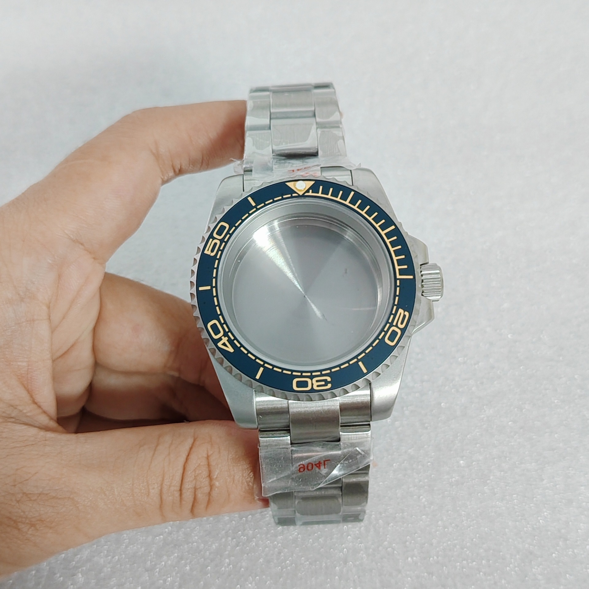 Dark blue circle with white text magnifying glass