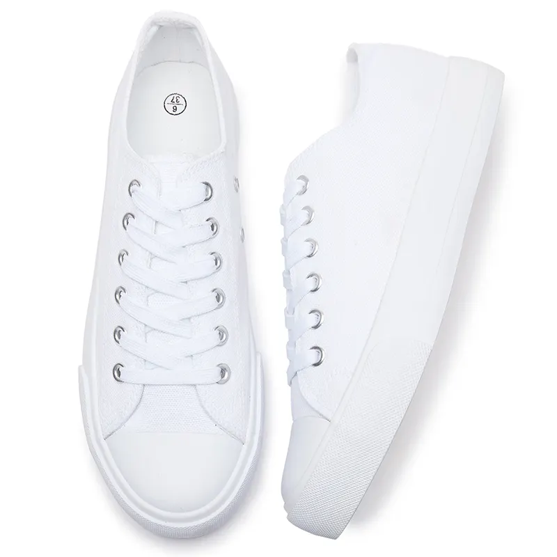 Zapatillas de lona personalizadas de color sólido clásico Zapatos de lona blancos independientemente del género Zapatos vulcanizados NR de algodón EVA