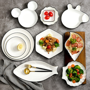 中国工厂食品10级 “陶瓷快餐托盘3分网格瓷盘白色黑色轮圈包装学校