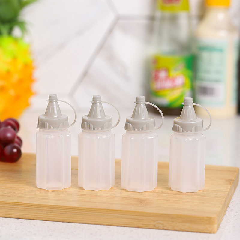 Bouteilles à presser-quatre bouteilles à presser gris blanc carte suspendue opp
