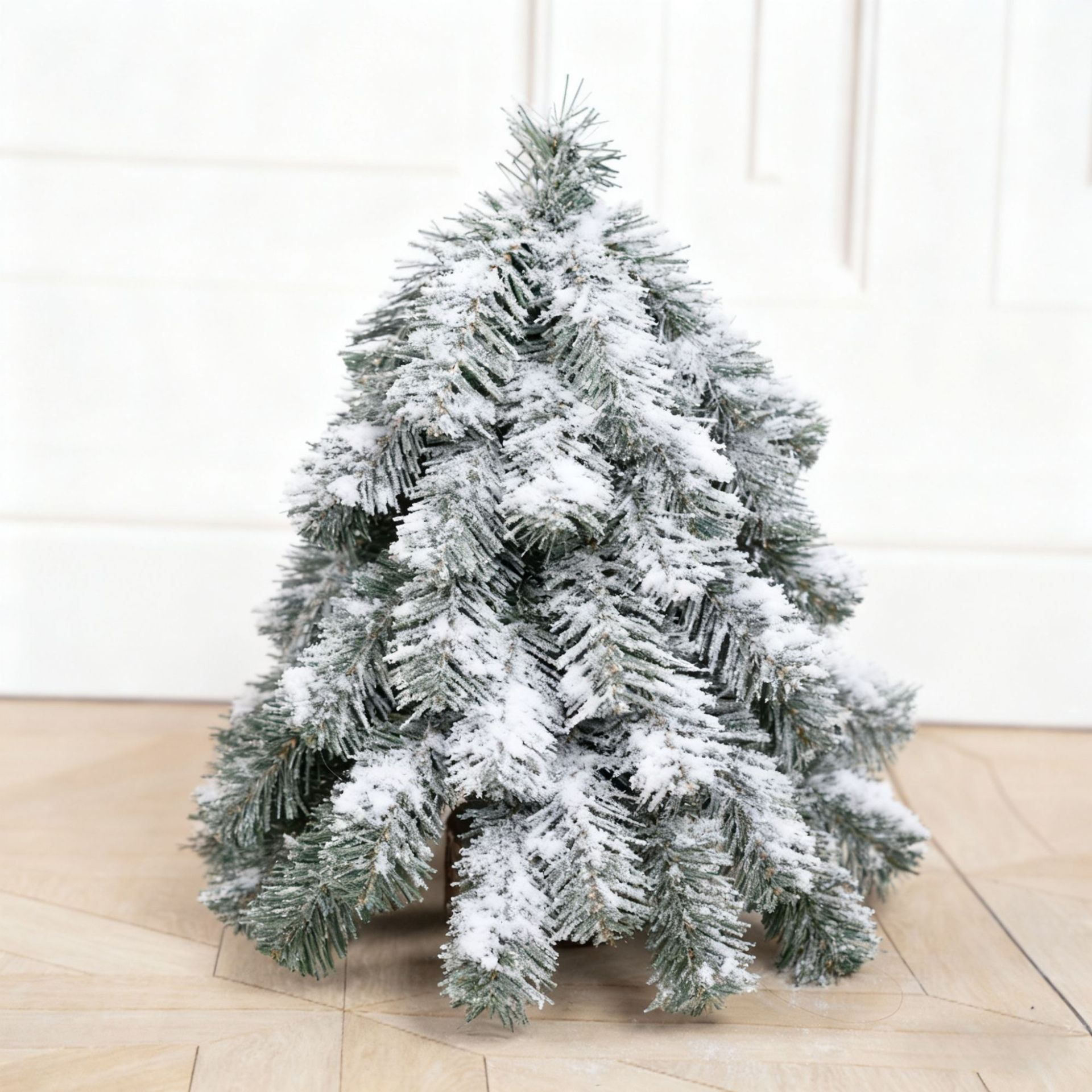 Sapin noble en PVC vert armée, effet neige