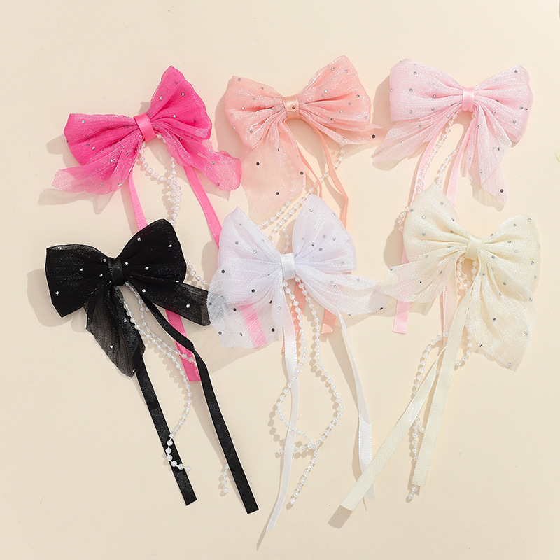 2.Noeud en tulle clouté de strass - long ruban de perles