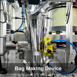 Máquina de embalaje de botones de ropa de conteo de disco doble automático de fácil operación Máquina de embalaje vertical de bolsa de pellets pequeña - Product Image 5