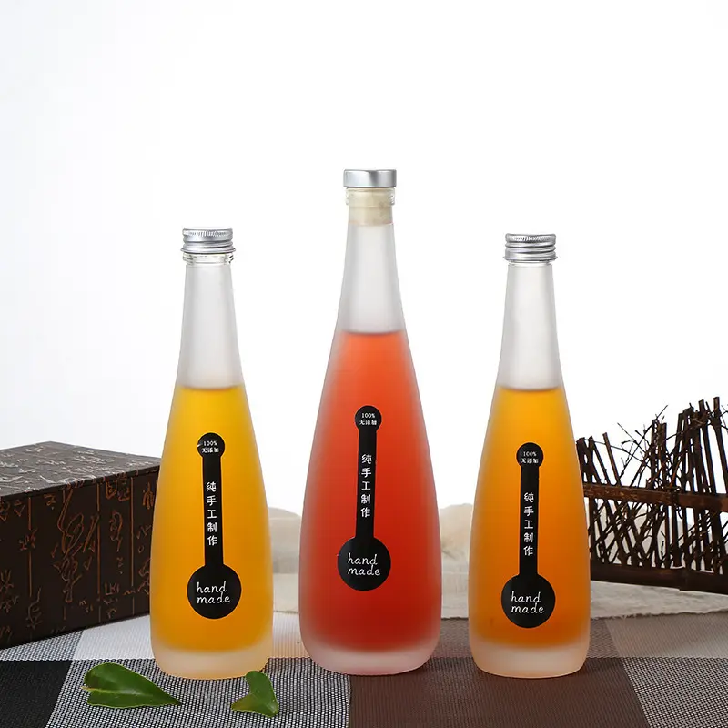 Contenitore per liquore rotondo per Cocktail Sake Rum all'ingrosso 330ml 500ml bottiglia di vetro per vino ghiaccio vuota con Logo personalizzato con tappo di bottiglia