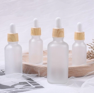 <strong>5ml</strong> 15ml 20ml 30ml 50ml Empty clear Frosted Glass <strong>Perfume</strong> Essential Oil Serum Dropper Bottle with Wood Grain Lid for Packaging - Product Image 5