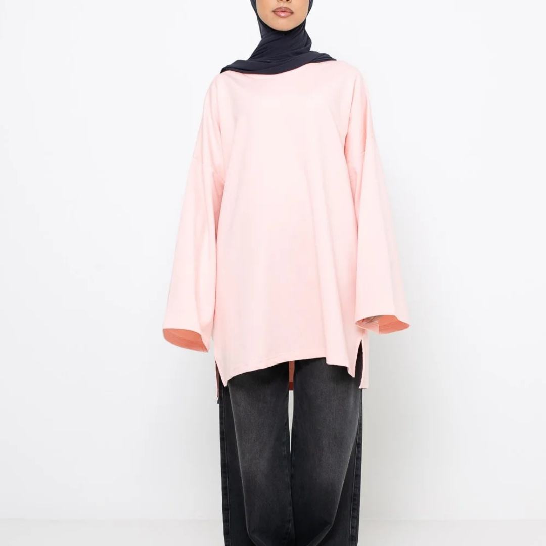 เสื้อผ้าฝ้ายสีชมพูอ่อน