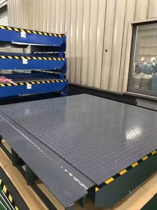 Truck <strong>Unloading</strong> Ramp Hydraulic Boarding Bridge Fixed <strong>Dock</strong> Ramp Hydraulic <strong>Dock</strong> <strong>Leveller</strong> for <strong>Loading</strong> and <strong>Unloading</strong>