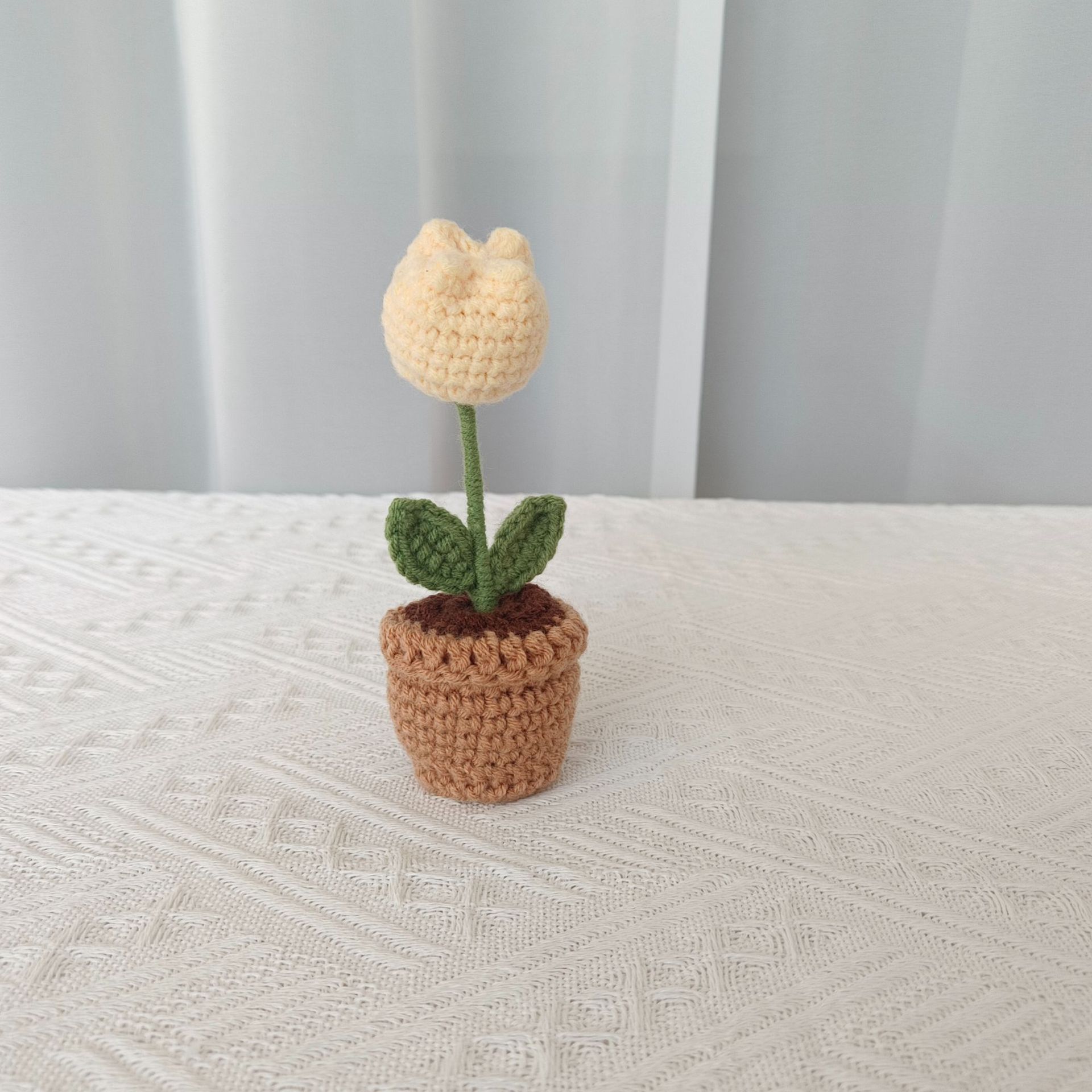 yellow tulip potted plant