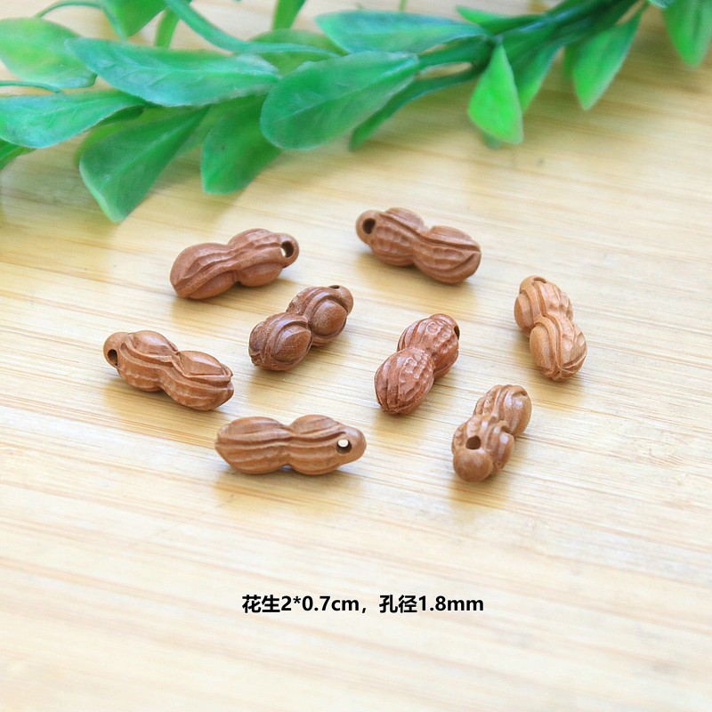 Peach wood peanut pendant