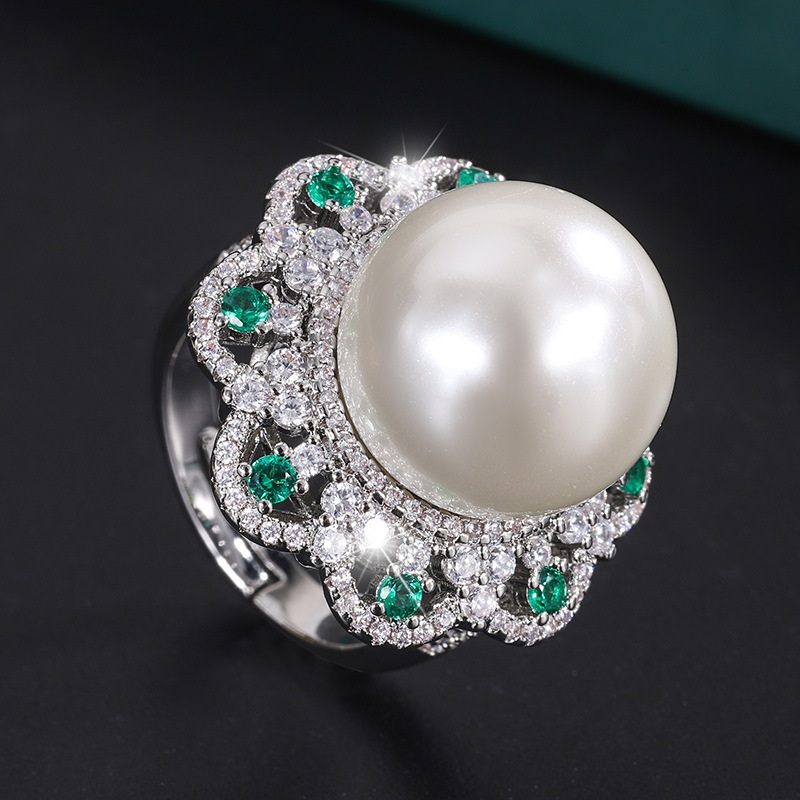 Anillo de oro blanco con perla blanca de tamaño abierto