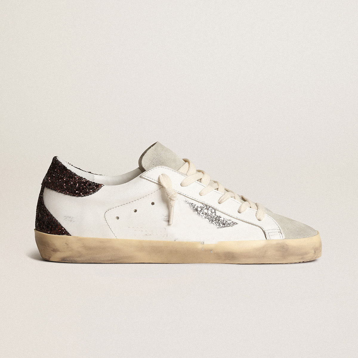 coda marrone glitterata