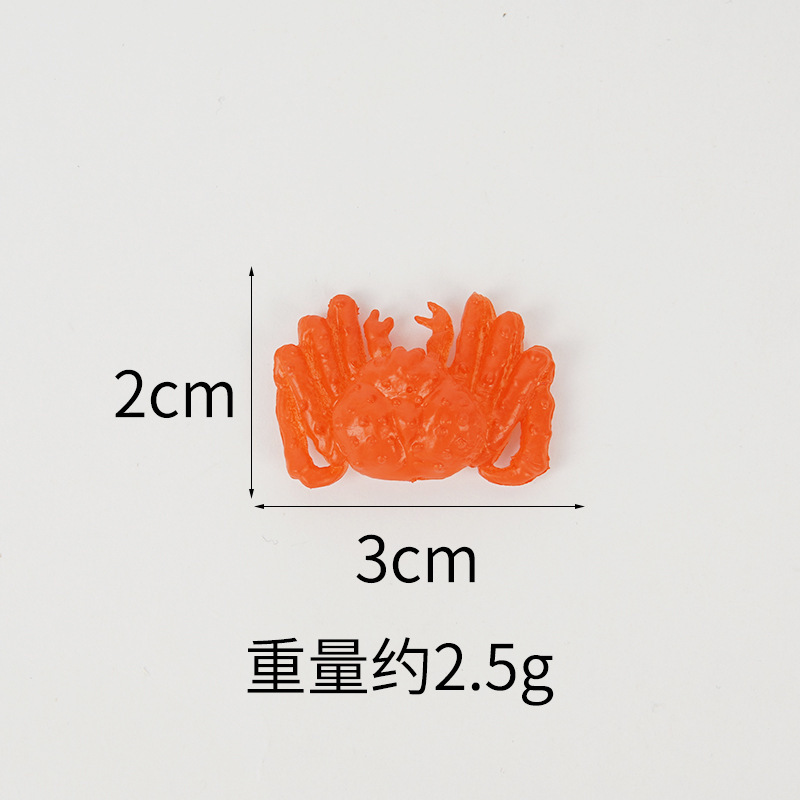 Un crabe royal rouge de 3 cm
