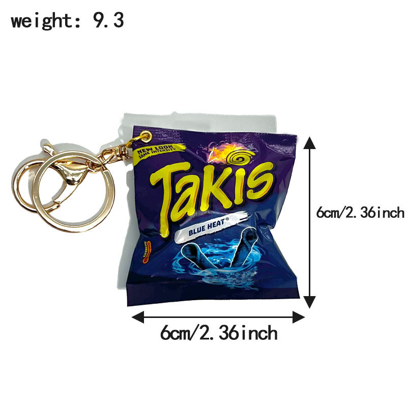 Bolsa de snacks Ta con hebilla azul y dorada.