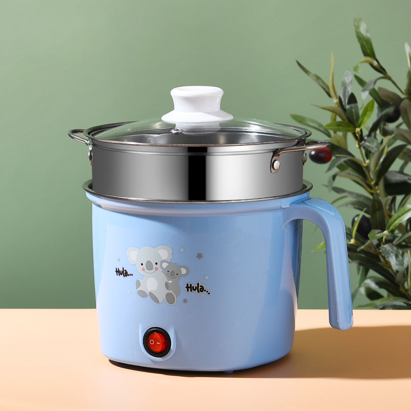 Pot bleu avec cuiseur vapeur en acier inoxydable