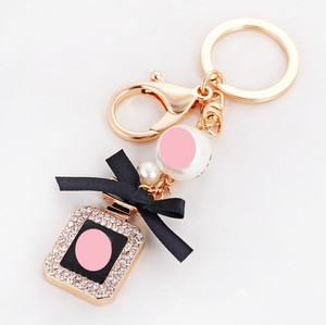 Custom Metal <strong>Key</strong> Ring with Chain Charm Keychains Portable Keychain Perfume Bottle Portable <strong>Fancy</strong> Keychain Perfume Bottle