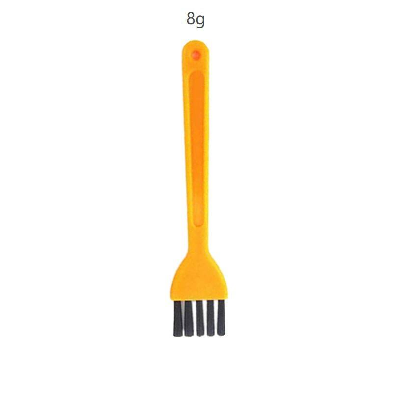 1 small yellow brush