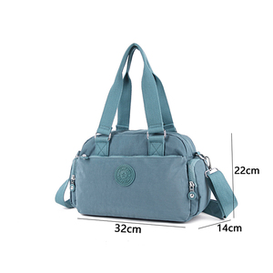Travel-Friendly Water-Repellent Handbag with Spacious Interior and Slots