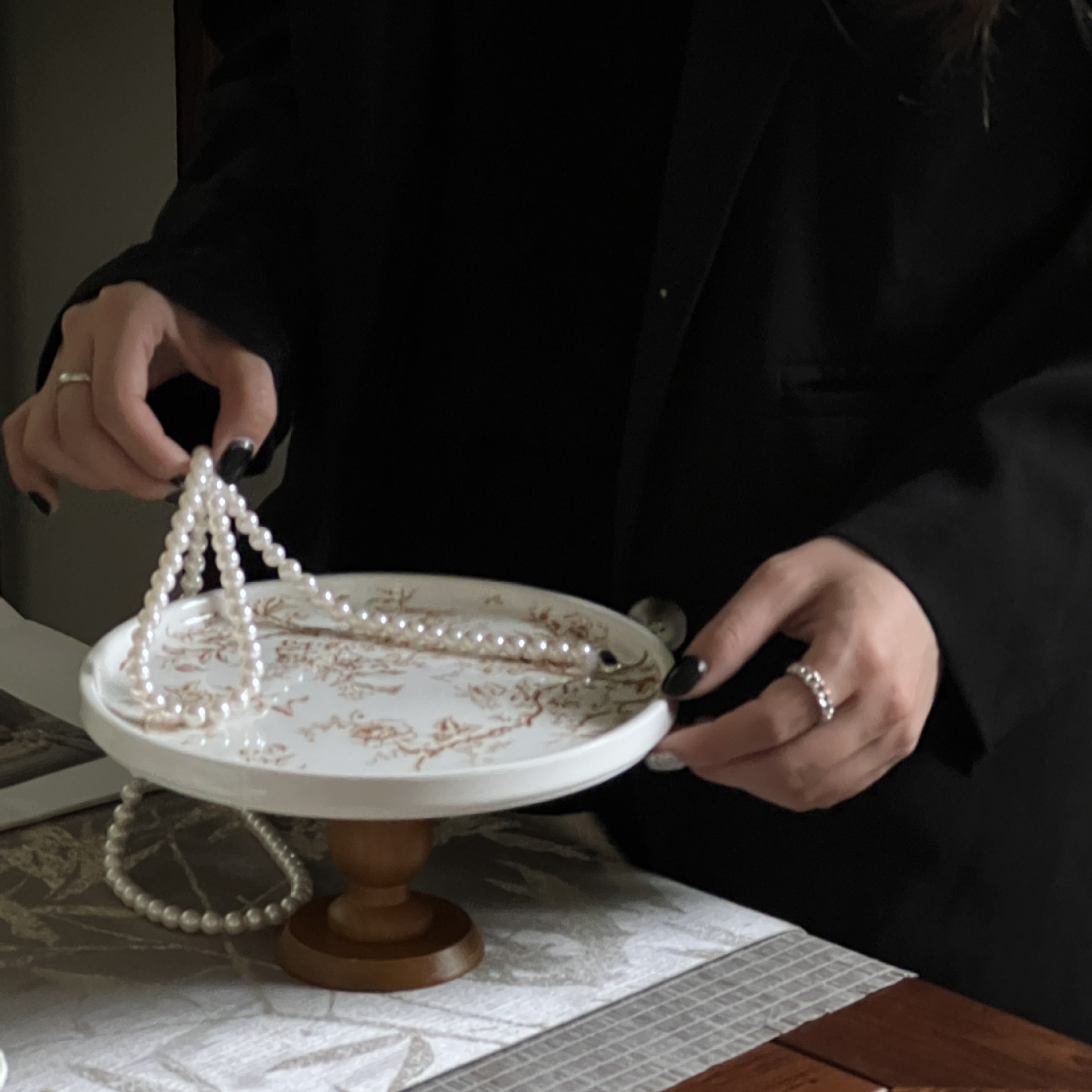 The tall feet are made of brown flowers and brown wood