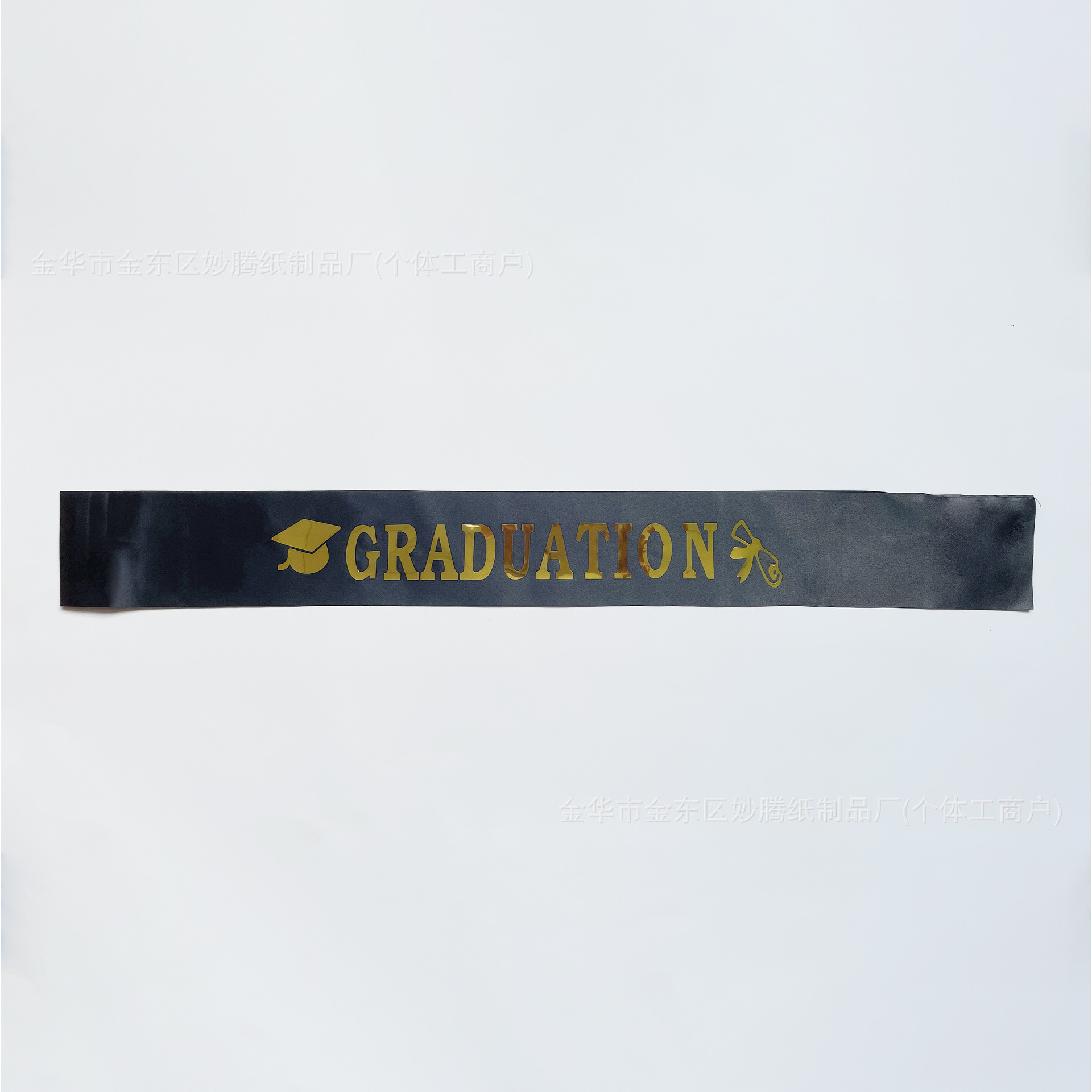 Black satin fabric with gold lettering