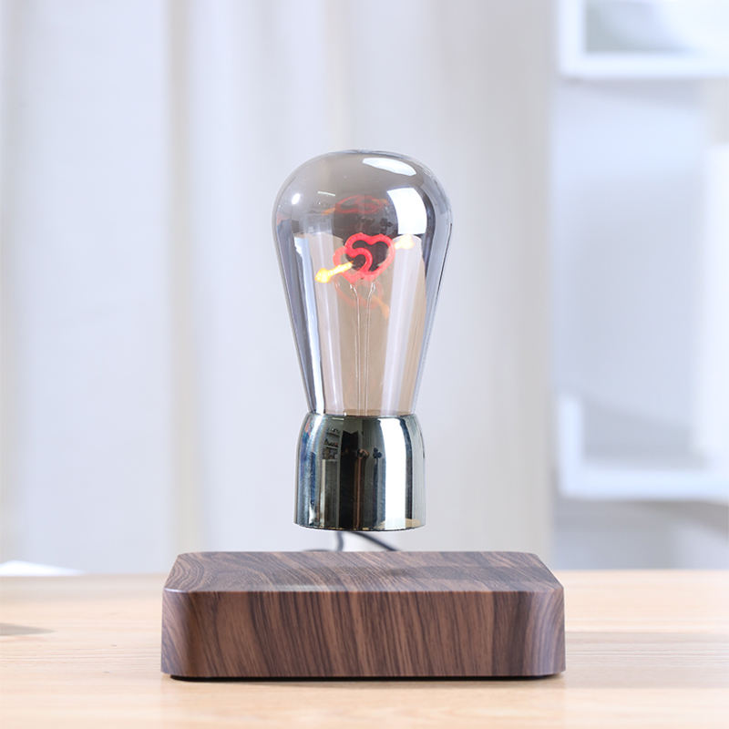 Ampoule en lévitation à base noire
