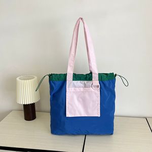 多機能大容量ショッピングキャンバスバッグプルロープカラーマッチング防水ショルダーバッグスーパーマーケットで購入