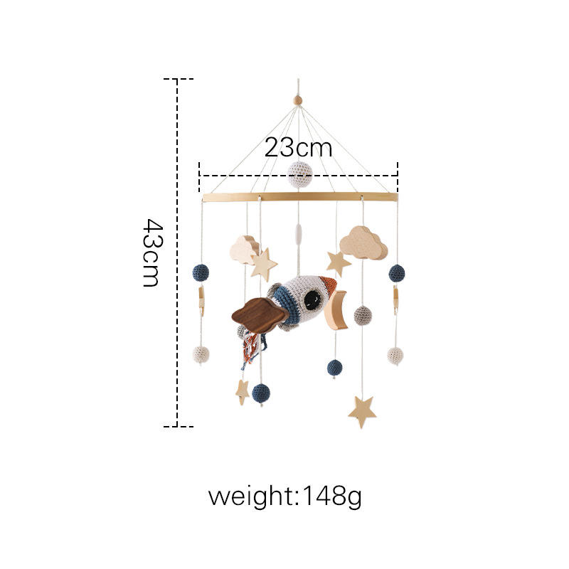 Cloche de lit jouet au crochet de fusée