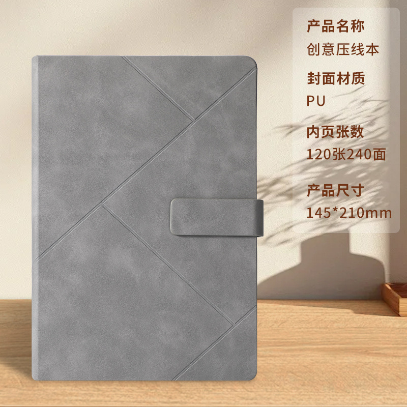 Libro con hebilla de alambre gris.