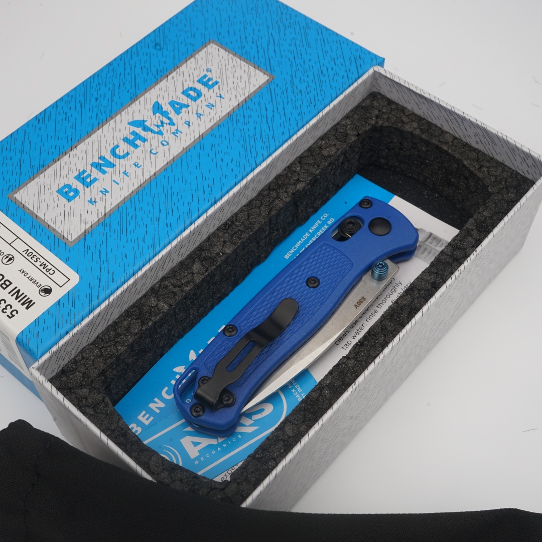 Blue-handled white blade