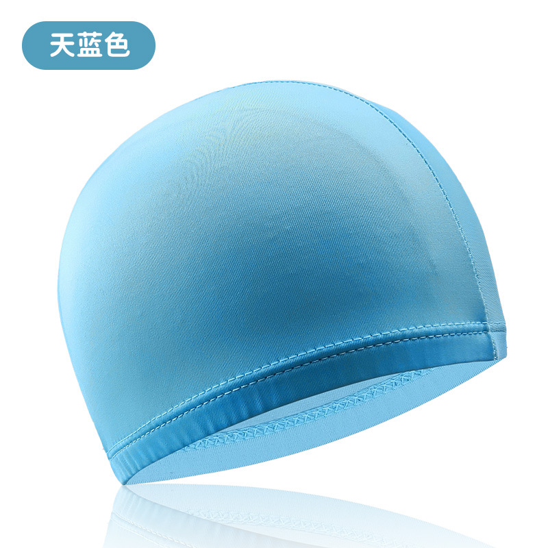 Light blue, highly elastic and comfortable, not waterproof.