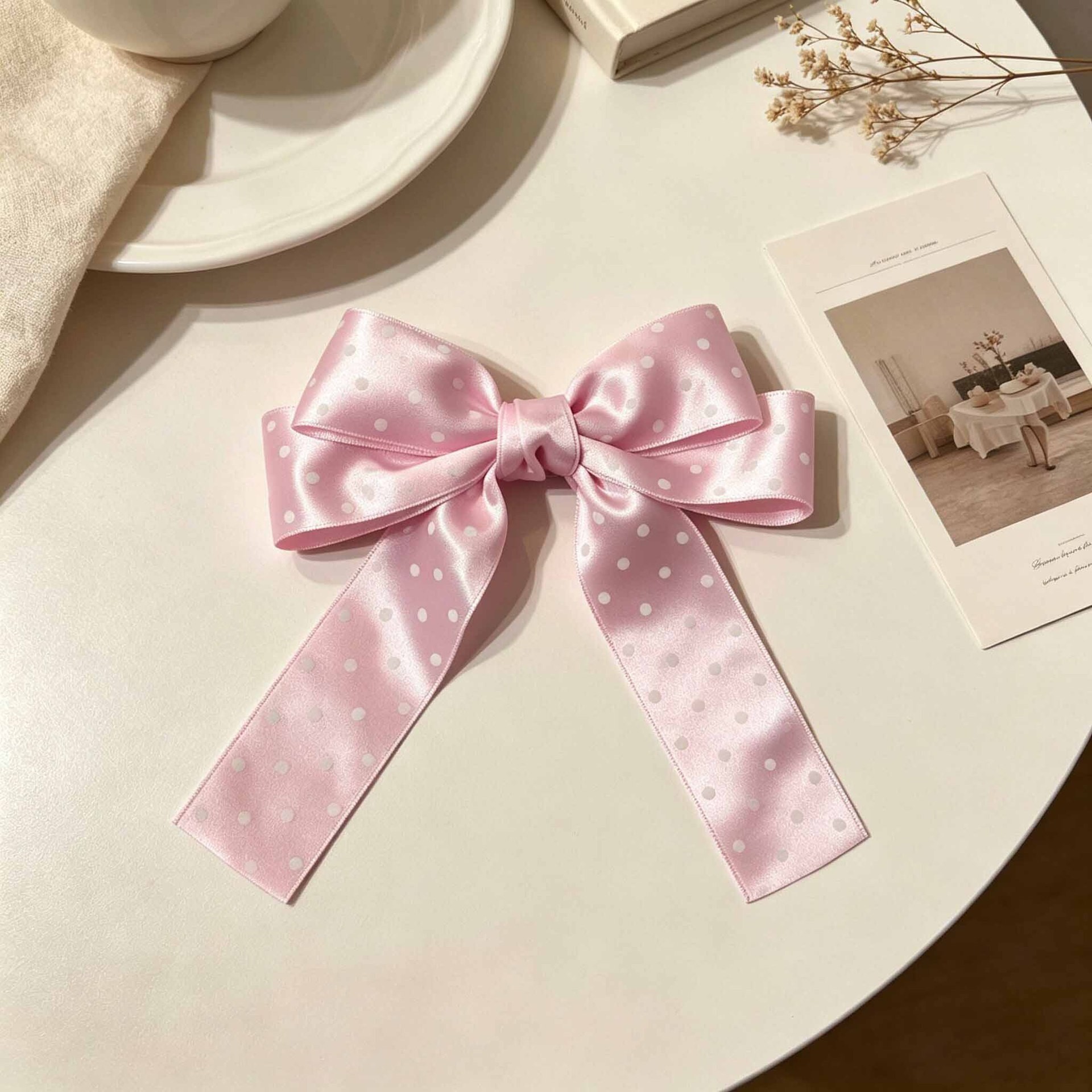 Barrette à cheveux noeud à pois rose