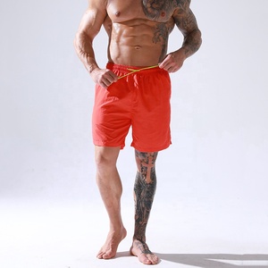Diseño personalizado Color sólido Tallas grandes Hombres Verano Playa Tabla Cintura Cuerda Impermeable Nylon Traje de baño Secado rápido Estampado Pantalones cortos Pantalones - Product Image 1