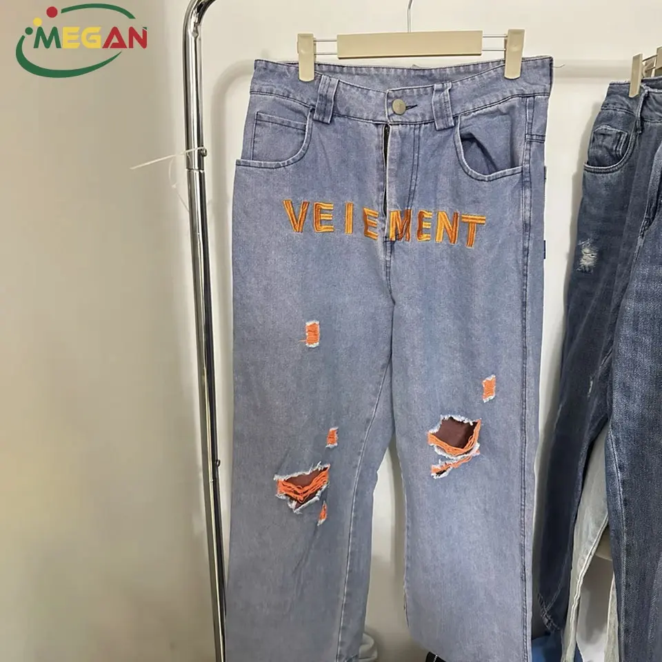 Megan all'ingrosso parsimonioso usato Denim pantaloni preamati Jeans stracciati per gli uomini In massa